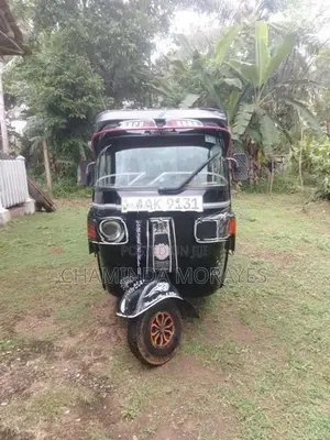 Bajaj RE 2013