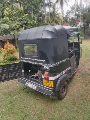 Bajaj RE 2013