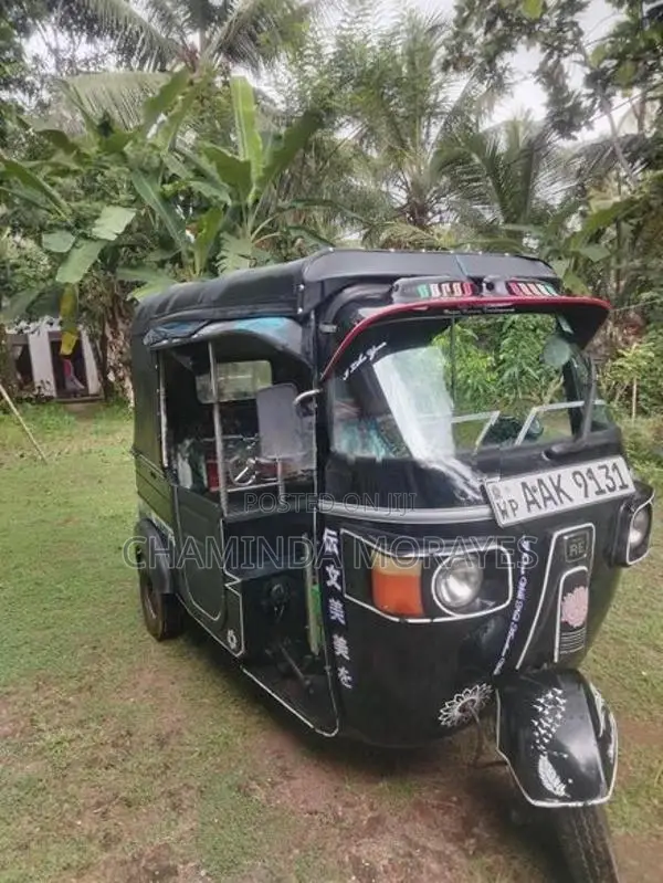 Bajaj RE 2013