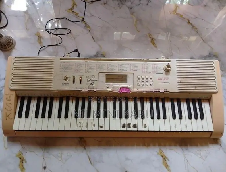 Casio Light Key 105 Electronic Keyboard