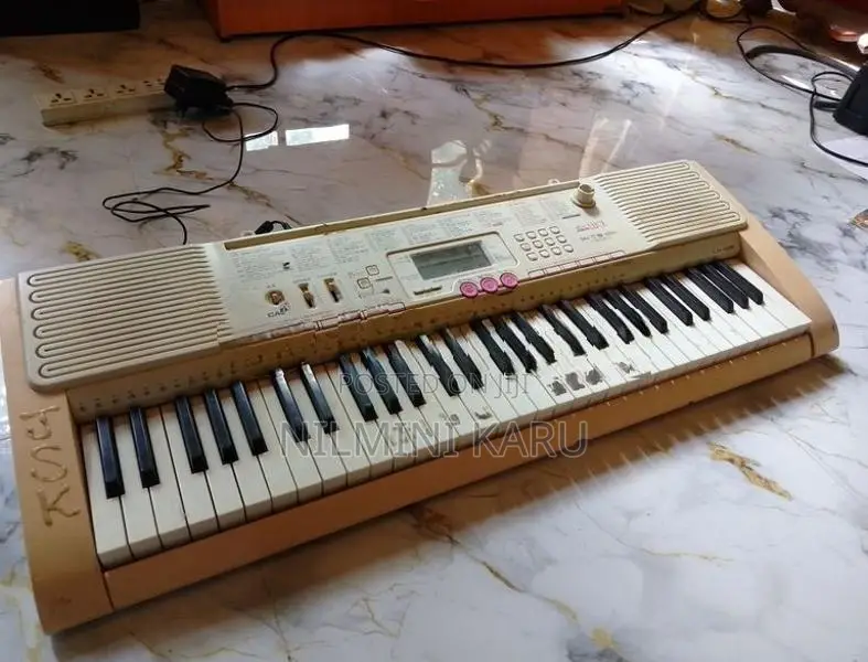 Casio Light Key 105 Electronic Keyboard