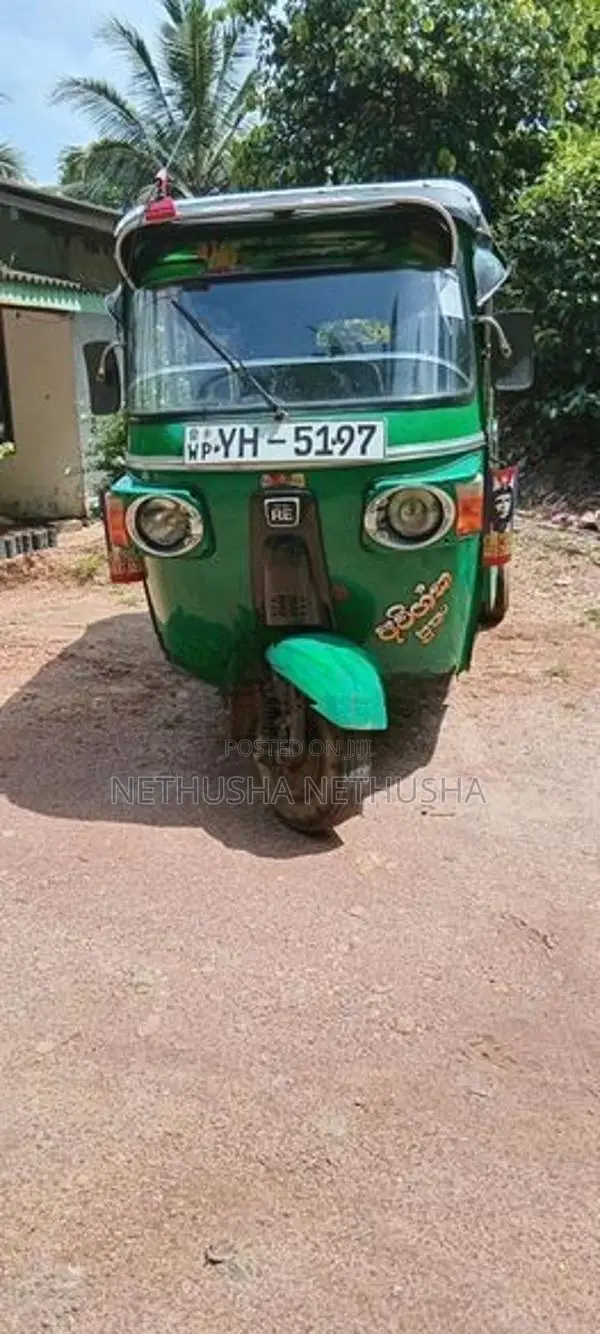 Bajaj RE 2013