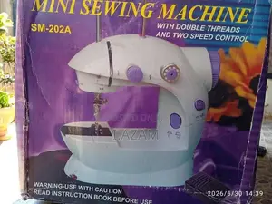 Mini Electric Sewing Machine