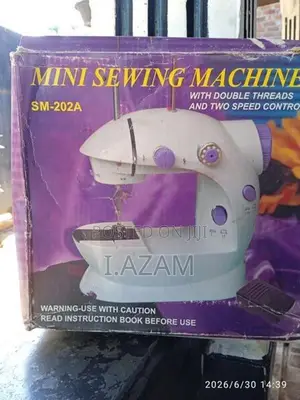 Mini Electric Sewing Machine