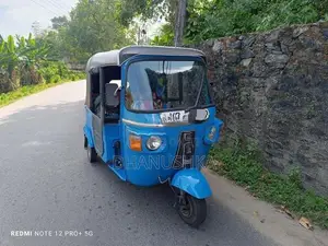 Bajaj RE 2011