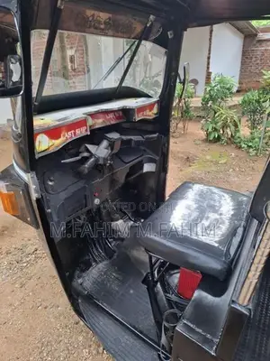 Bajaj RE 2010