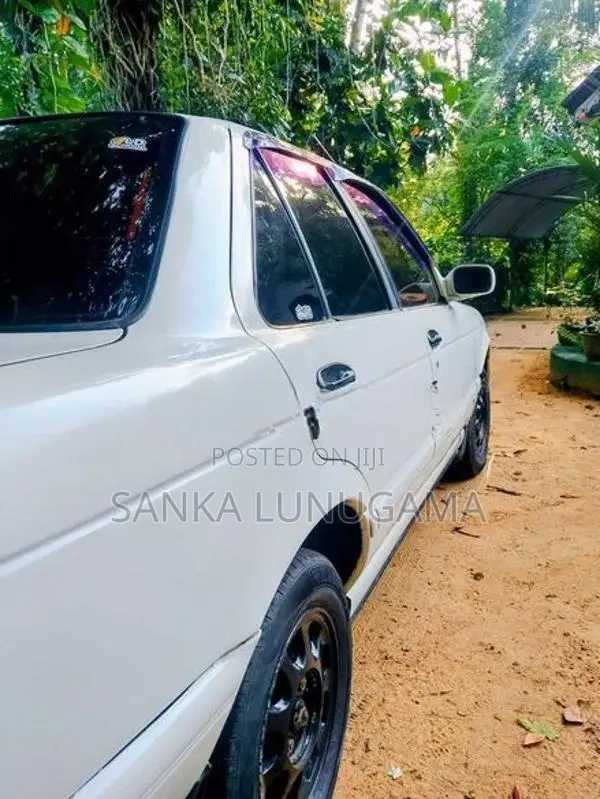 Nissan FB13 EX Saloon 1992