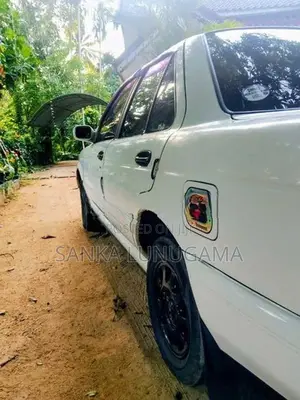 Nissan FB13 EX Saloon 1992