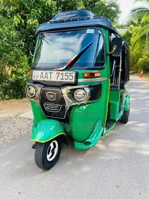 Bajaj RE 2014