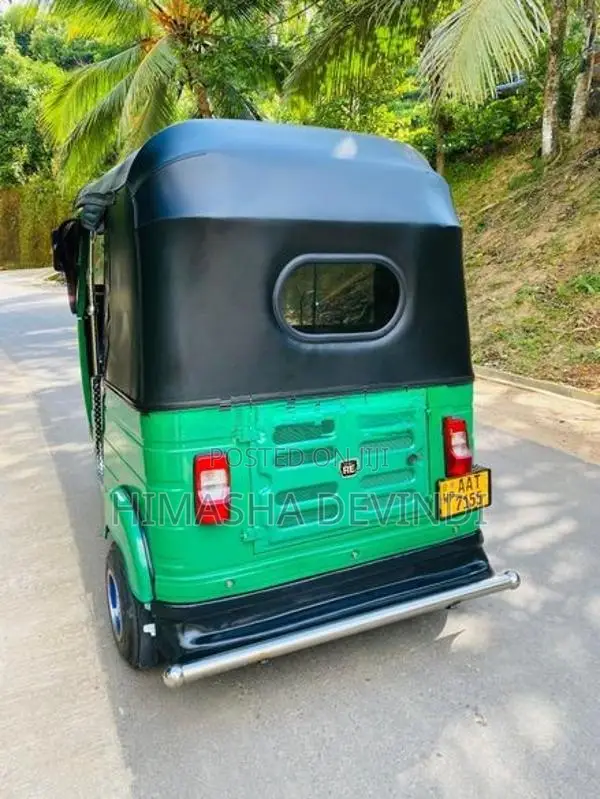 Bajaj RE 2014