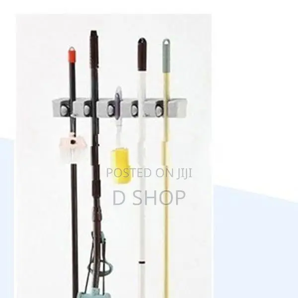 Broom Stick & Mop Holder organizer