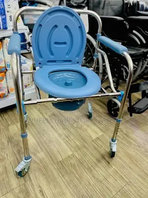 Commode chair with wheel