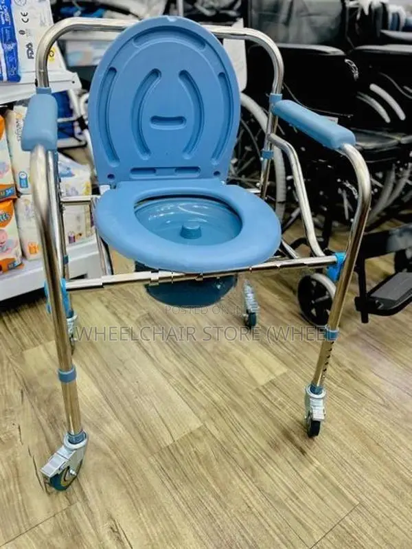 Commode chair with wheel