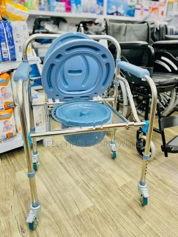 Commode chair with wheel
