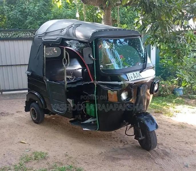 Bajaj RE 2013