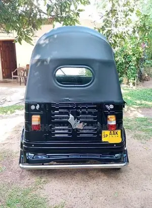 Bajaj RE 2013