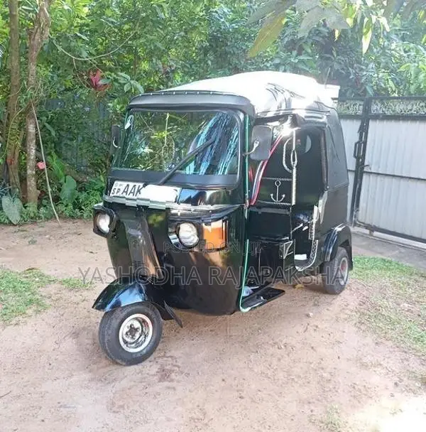 Bajaj RE 2013