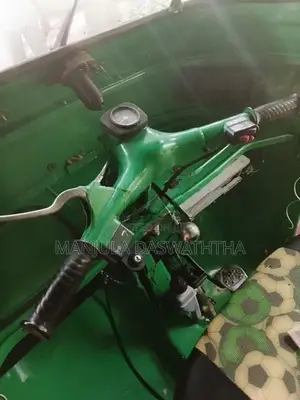 Bajaj RE 2002