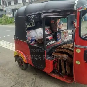 Bajaj RE 2013