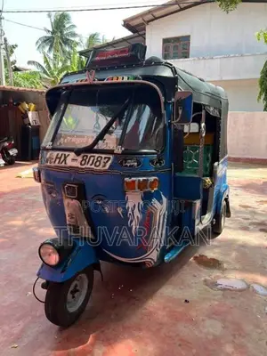 Bajaj RE 2003