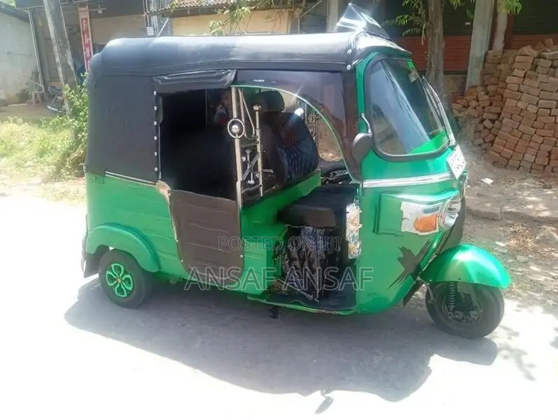 Bajaj RE 2013