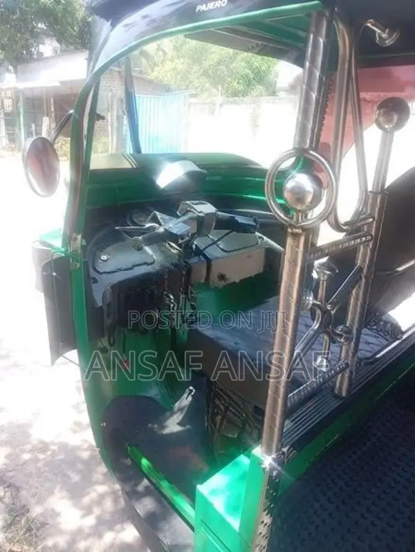 Bajaj RE 2013