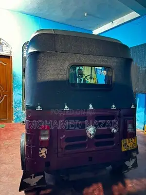 Bajaj RE 2014