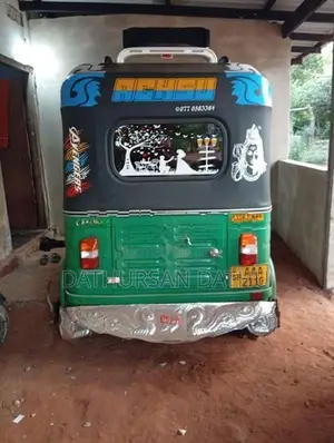 Bajaj RE 2014