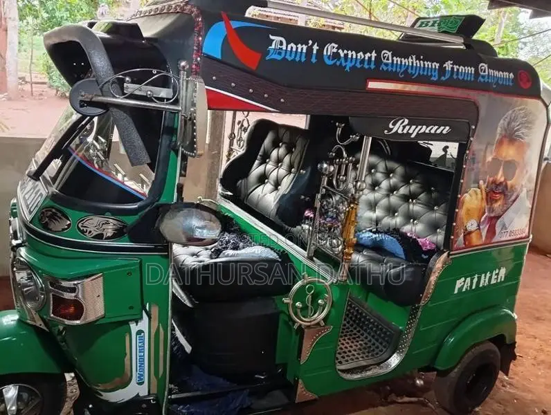 Bajaj RE 2014