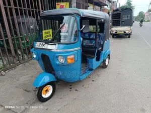 Bajaj RE 2013
