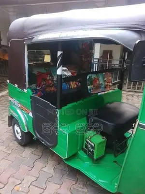 Bajaj RE 2013