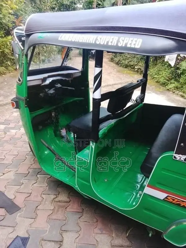 Bajaj RE 2013