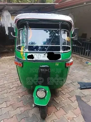 Bajaj RE 2013