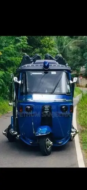 Bajaj RE 2013