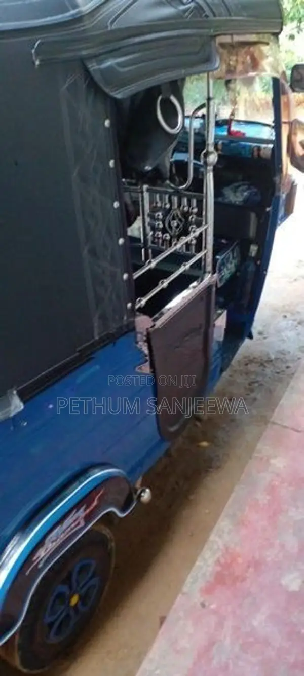 Bajaj RE 2013