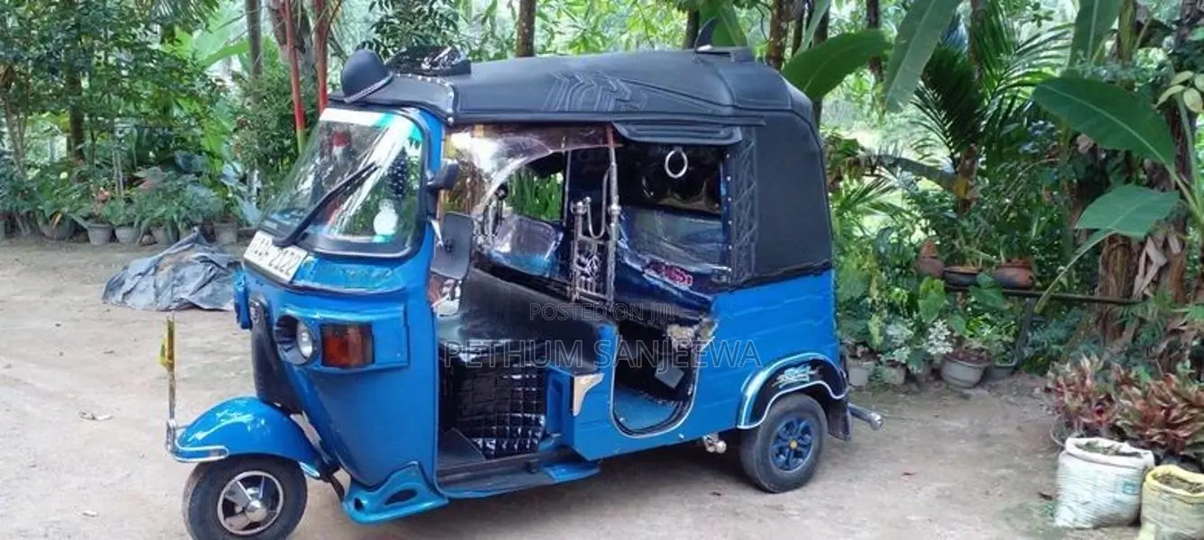 Bajaj RE 2013