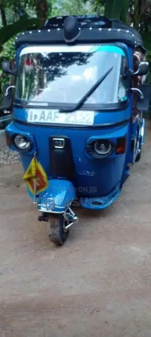 Bajaj RE 2013