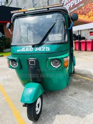 Bajaj RE 2013