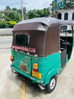 Bajaj RE 2013