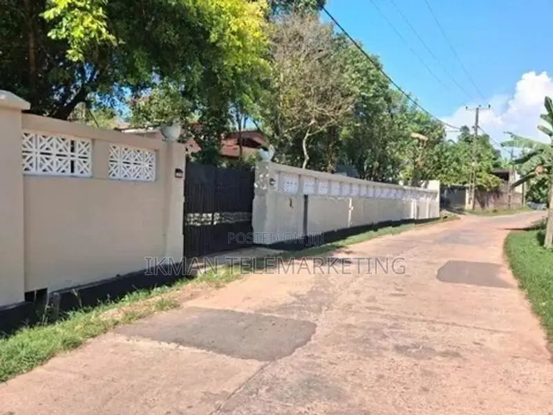 Land with House for Sale in Maggona