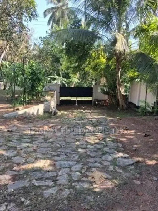 Land with House for Sale in Maggona