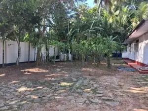 Land with House for Sale in Maggona