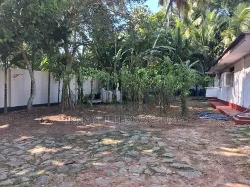 Land with House for Sale in Maggona