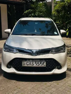 Toyota Axio Hybrid WXB 2016