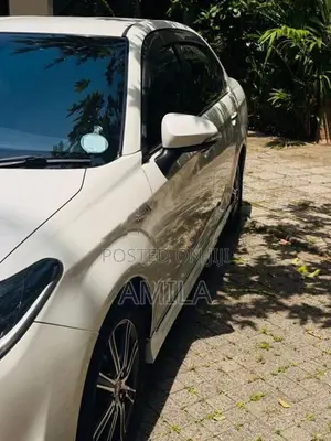 Toyota Axio Hybrid WXB 2016