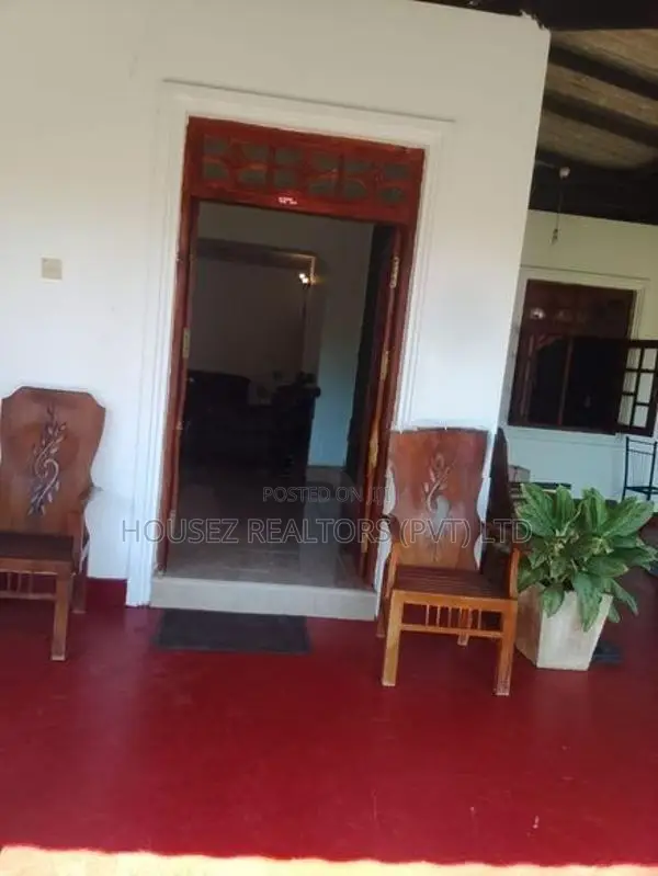 Charming House with Spacious Land for Sale