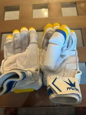 1 month used mids cricket batting gloves ( left hand )