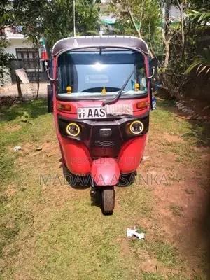 Bajaj RE 205 2014
