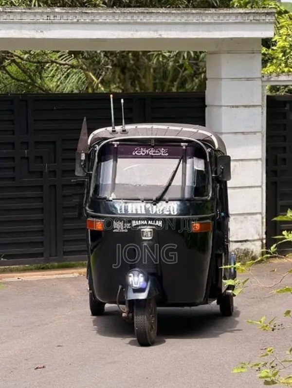 Bajaj RE 2013