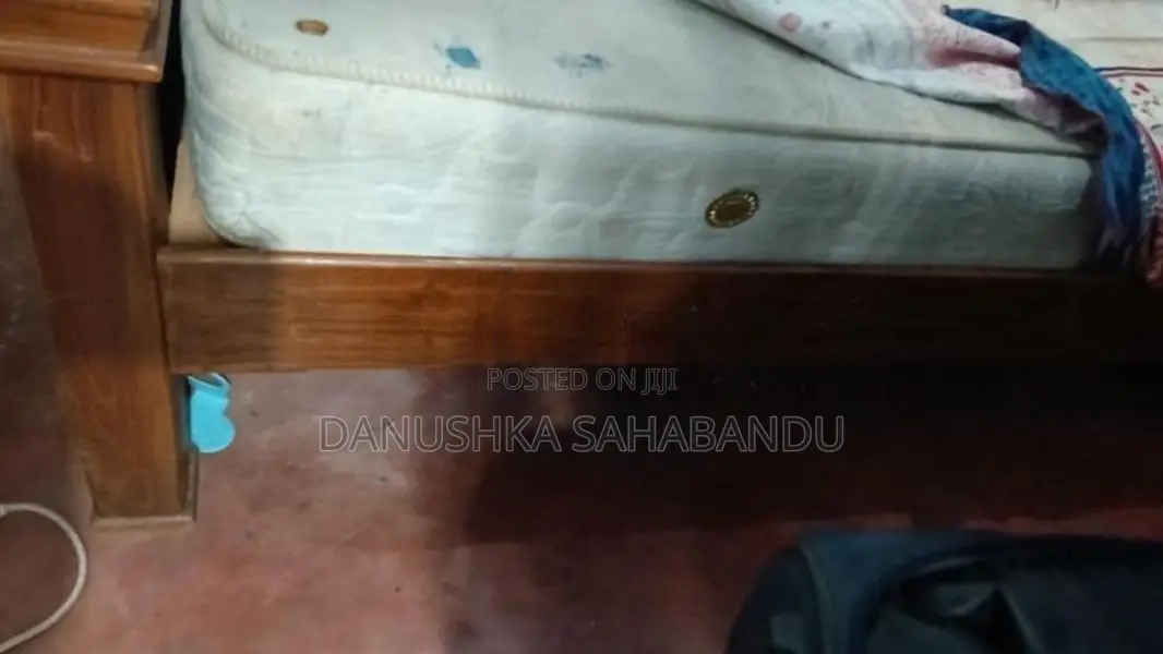 teak king size bed with spring mattress